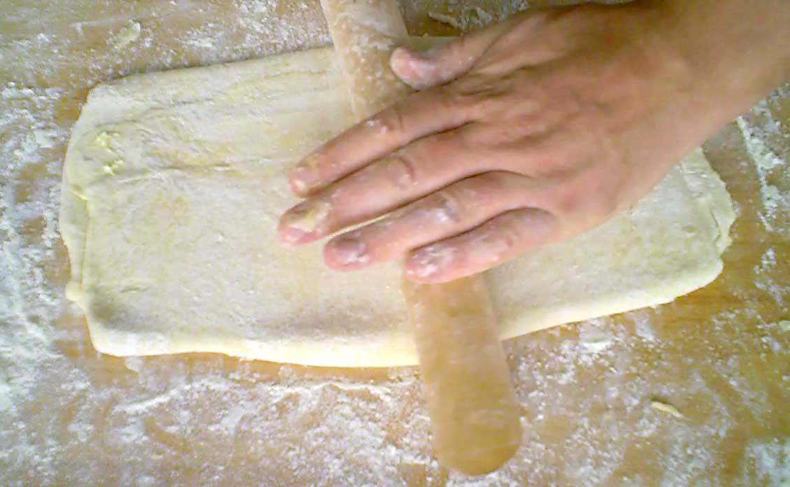 Puff pastry being rolled out