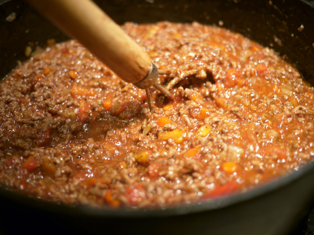 At this point you can just add all of the ingredients you have not added yet. This will result in a "wet meat sauce". Try tasting it at this stage. Then you will be surprised how important it is to let it simmer and reduce for a looong time.