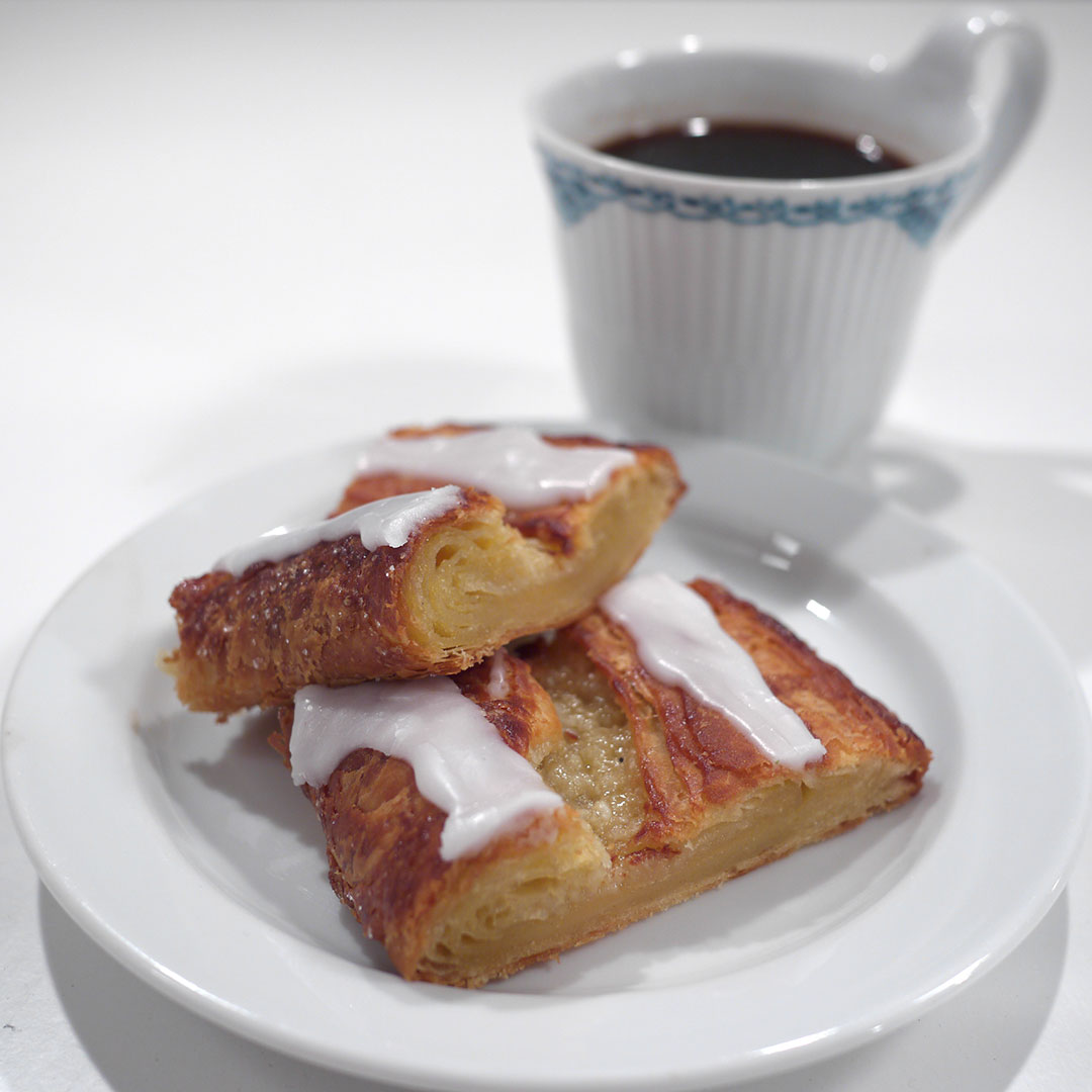 Danish pastry and a cup of cake.