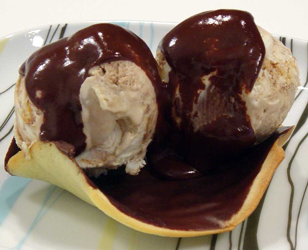 Hot chocolate sauce on cold cold ice.
